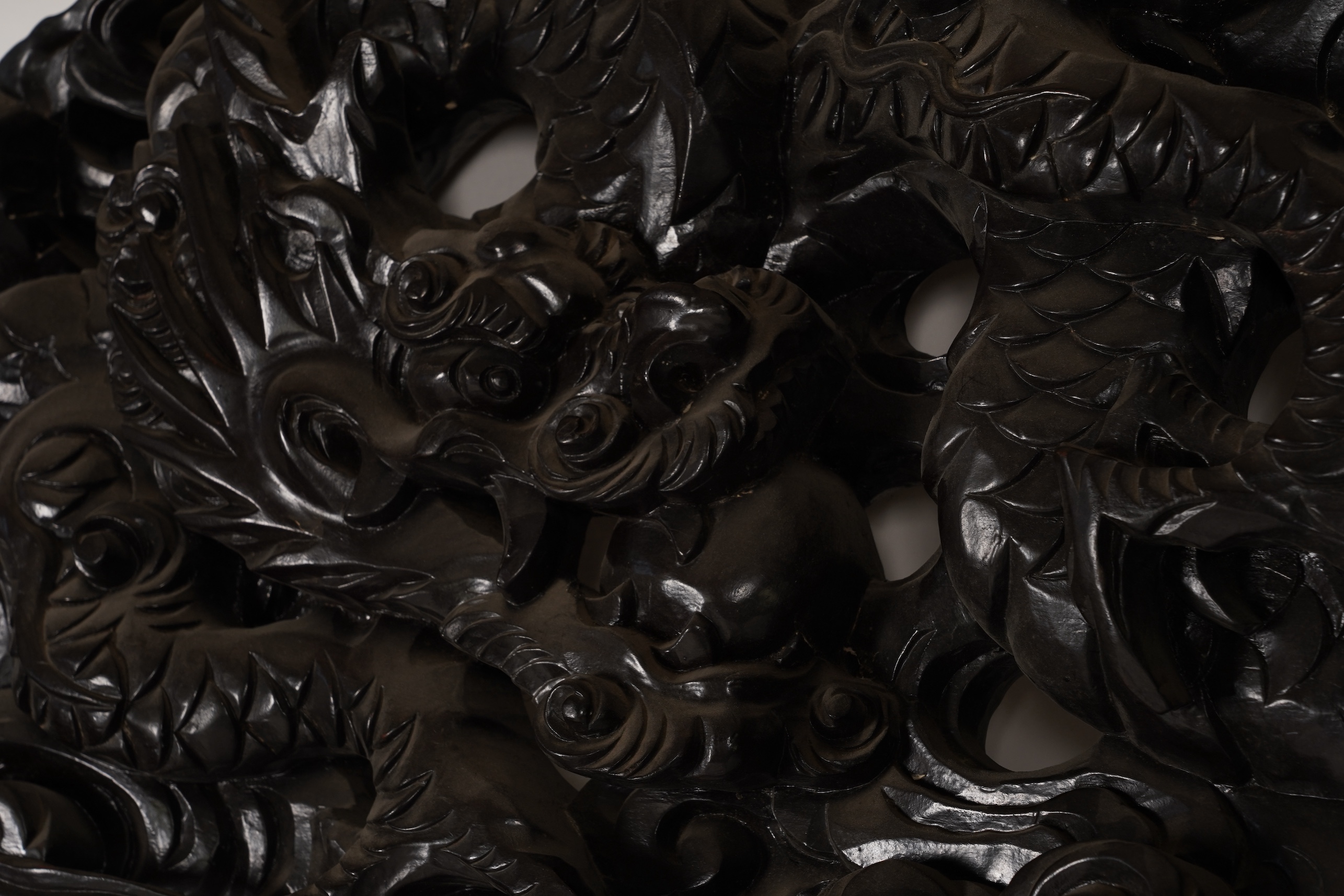 A pair of large Japanese carved hardwood ’dragon’ screen frames, Meiji period